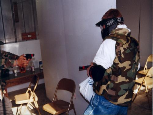 Robber and CHL holder exchange shots