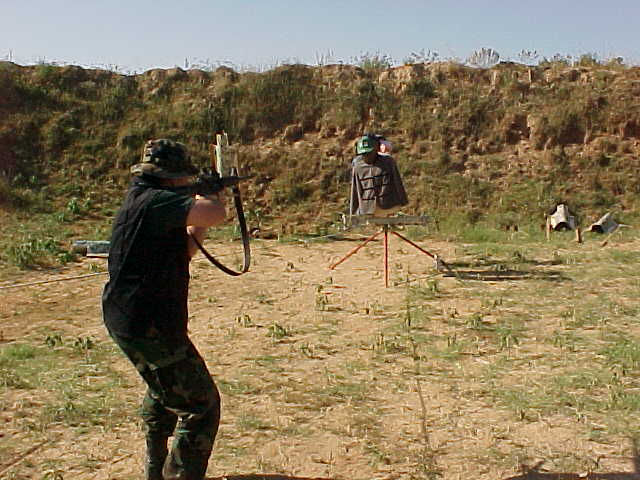Chris firirng at a target